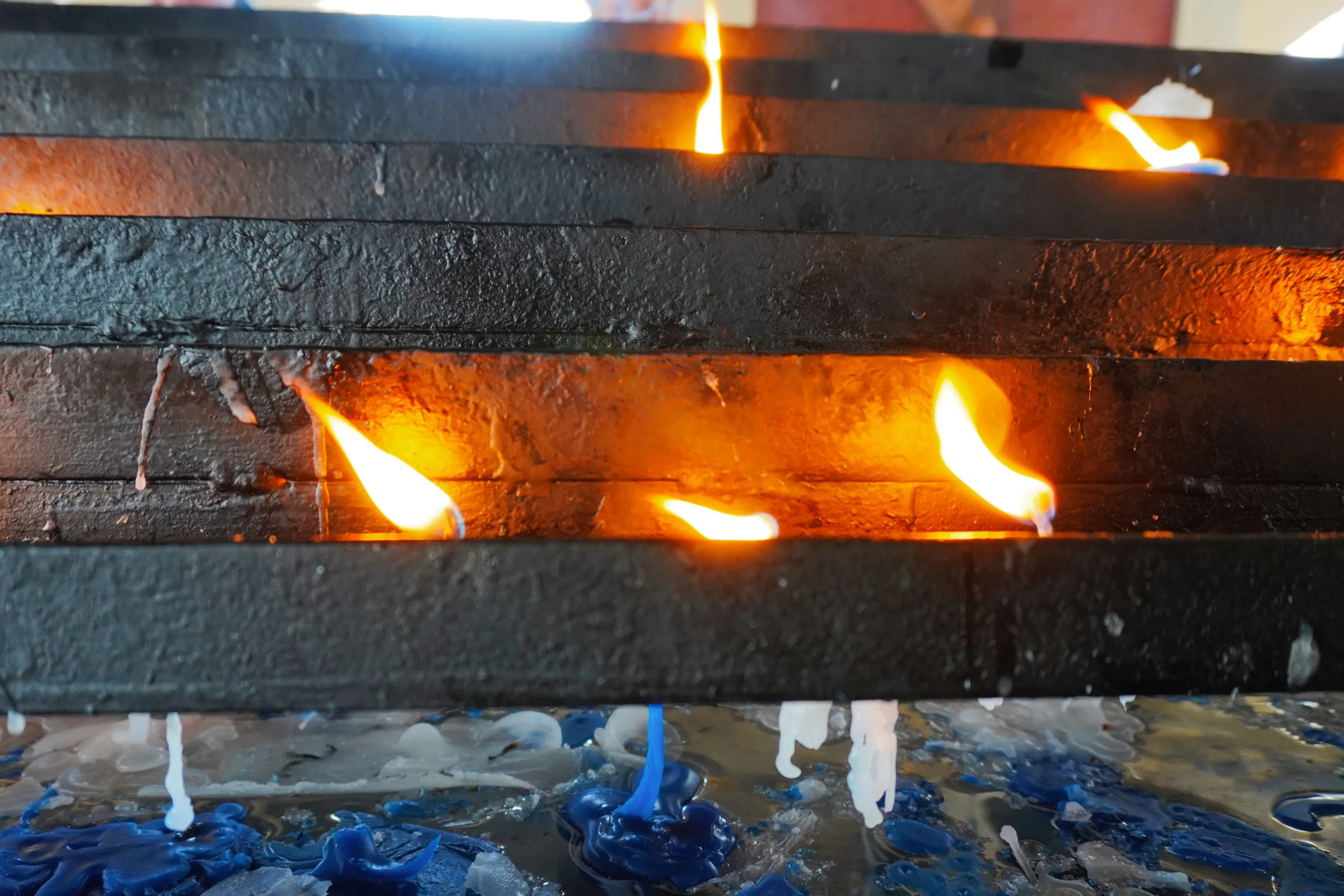 Lit candles. We got the blue ones, but mistakenly lit them with the white candles 🕯️